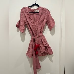 Red and white mini dress with pink and red Pom pom accent and tie waist